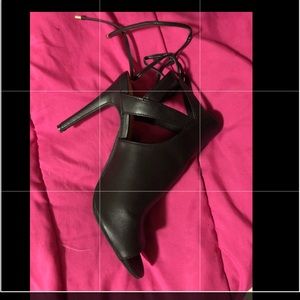 Black leather open toed heels